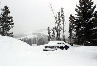 Car stuck in a snow after a heavy blizzrd