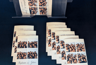 A stack of printed photographs