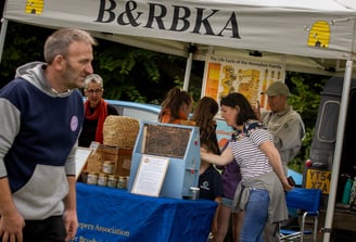 A local business advertising their products at Cwmdu Agricultural show