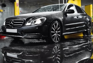 black and silver mercedes benz steering wheel