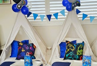 teepee slumber hire game night theme with balloon decorations and garland