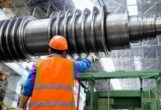 a man in a safety vest and a hard hat