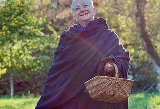 Alessandra Spisni in the Bolognese countryside, showcasing Emilia-Romagna's culinary heritage