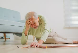 physiotherapy at home for seniors - an elderly man is upset on the floor after a fall
