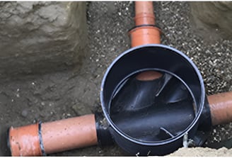 Groundwork contractor preparing Drainage