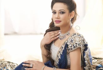 a woman in a blue dress and jewelry | Fashion & Lifestyle Exhibition | THE KABIR COMPANY