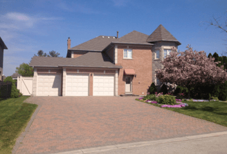 a house with a driveway and driveway with a driveway