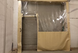 workshop roller door wind breaker with doorway