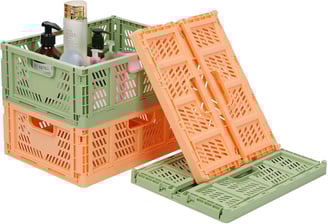 a couple of crates with bottles of liquid