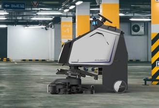 robot čisti garažu