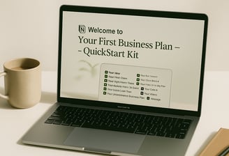 a laptop computer  with a notepad and pen