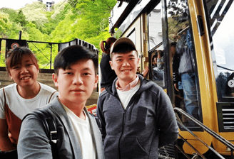 Taking the cable car ropeway up peak of Mount Tenjo