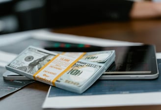 bunch of money and investing charts and graphs