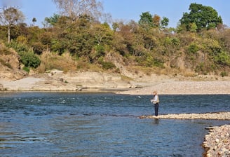 Fishing in a Himalayan river in Himachal Pradesh.