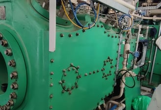 Reciprocating gas compressor