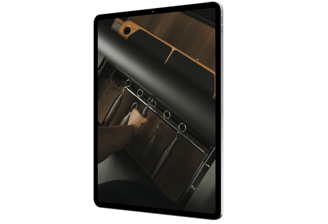 iPad with hand changing Pilates Reformer springs
