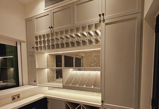 a kitchen with a wine rack and wine rack