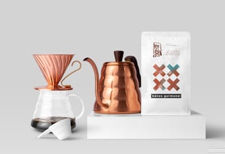scene of a coffee pot and coffee bag, copper color, modern design