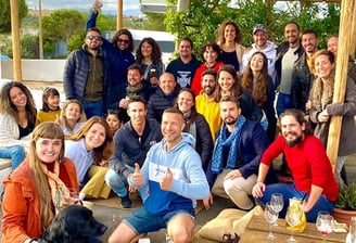 Group photo of Portimão Digital Nomads community at a meetup in Praia da Rocha, Portugal