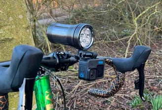 a bicycle with a light on it's handlebars