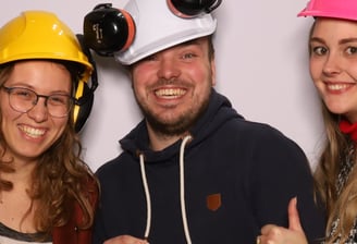 a man and woman in hard hats and hard hats