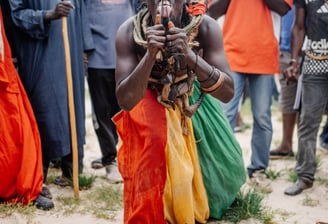 senegalese man slicing his tongue in casamance