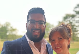 a man and woman standing next to each other