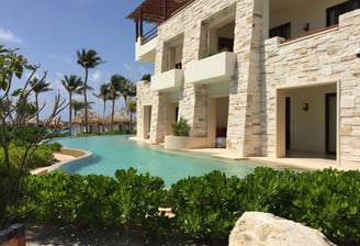 a large pool with a view of the ocean