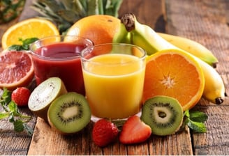 a bunch of fruit juices and fruit juice