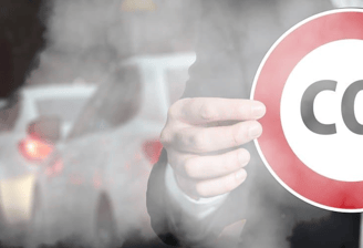 a man in a suit holding a sign that says co2