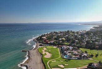 a golf course in Marbella with a view of the sea