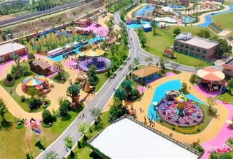 a large amusement park with a large playground area