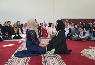 Shahada. A woman accepting Islam in the Imam Malik Mosque Mexico