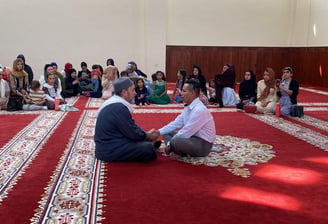 Shahada. A man accepting Islam in the Imam Malik Mosque Mexico