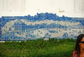 Lisbon - a wall mural of hand painted mosaic tiles in the city