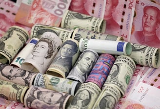 Asian Currencies Struggle Amid Dollar Strength and Mixed Chinese Data