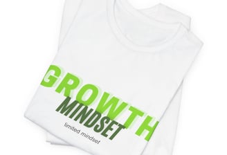 a white t - shirt with the words growth minds