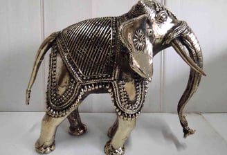 "Handcrafted brass elephant with artistic tribal design, right view-for overseas markets"