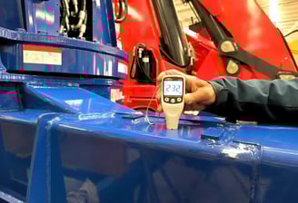 At our facility, we inspect blue paint thickness on a 5T truck mounted crane (crane truck) for durability & appearance.