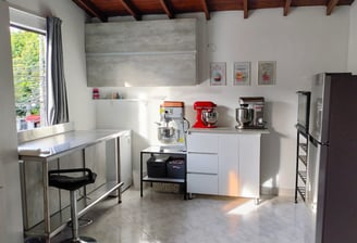a kitchen with a counter top and a coffee maker