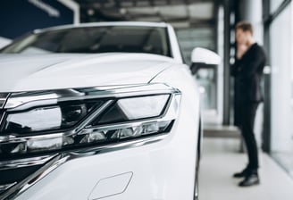 White car and a man