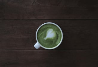 Top down view of Matcha grren tea in a cup