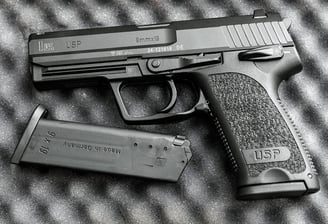 H&K Pistol with magazine resting on top of foam padding
