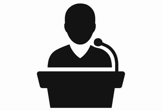 a man in a podium with a microphone
