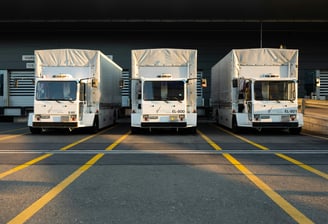 three cargo trucks lined up