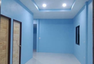 Finished hallway with painted walls and drywall ceiling with recessed lighting by Garnet Painting & Remodeling GA