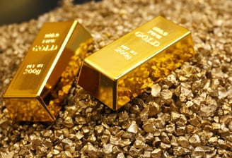 gold bullion bars in pile