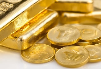 high quality gold bars and coins in pile