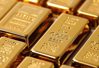 shiny gold bullion bars in stacks