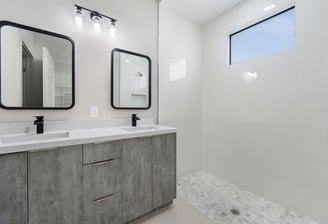 Master bathroom with dual sink, black finish faucets
